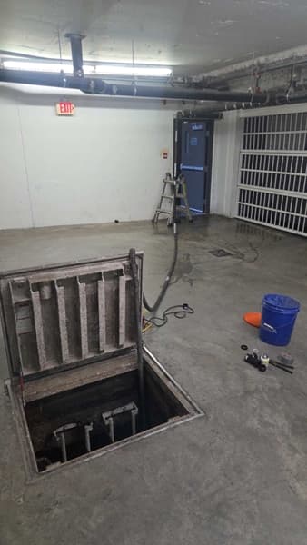 Open sump vault prepared for service