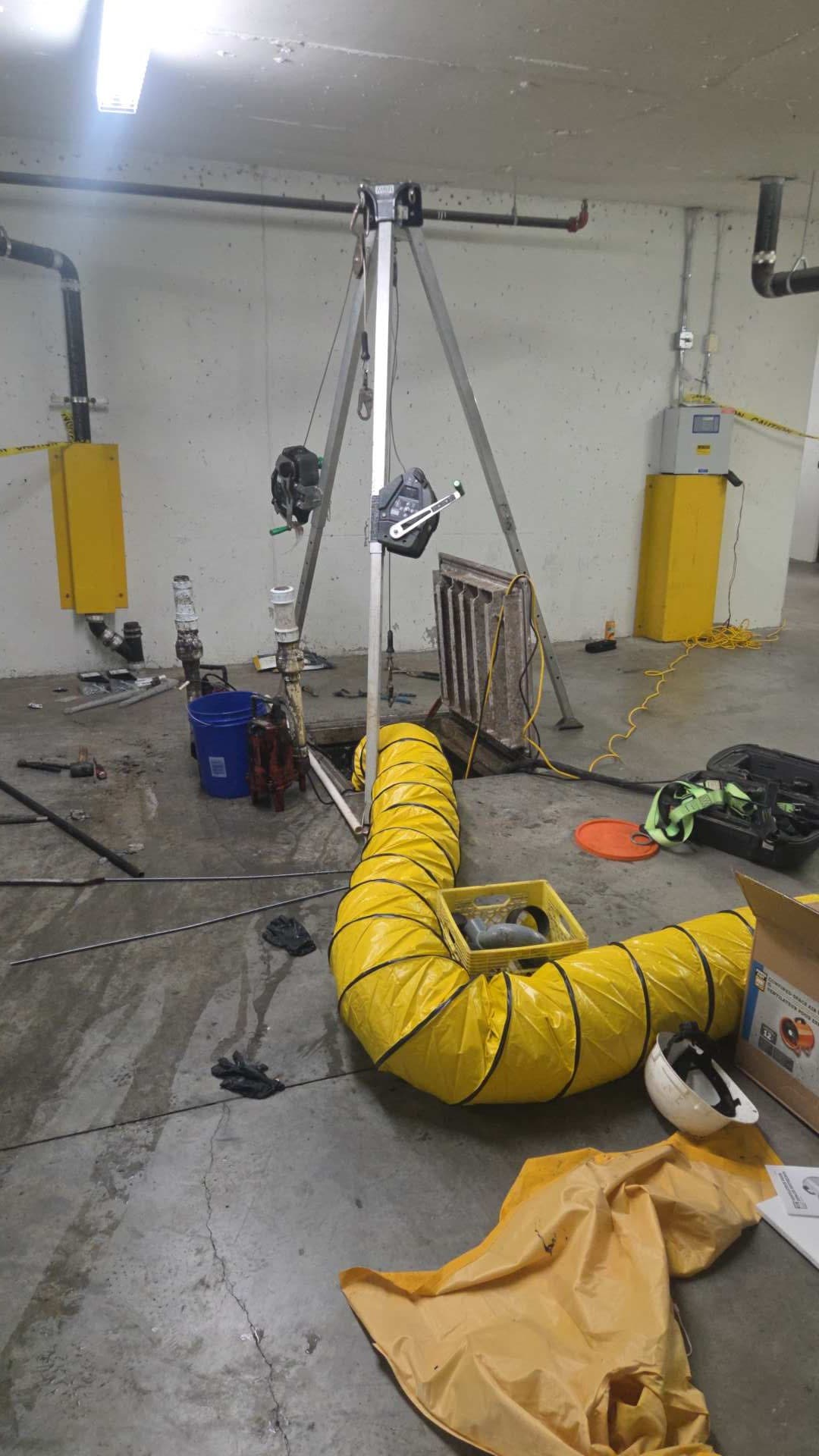Ventilation and retrieval equipment set up near the sump vault