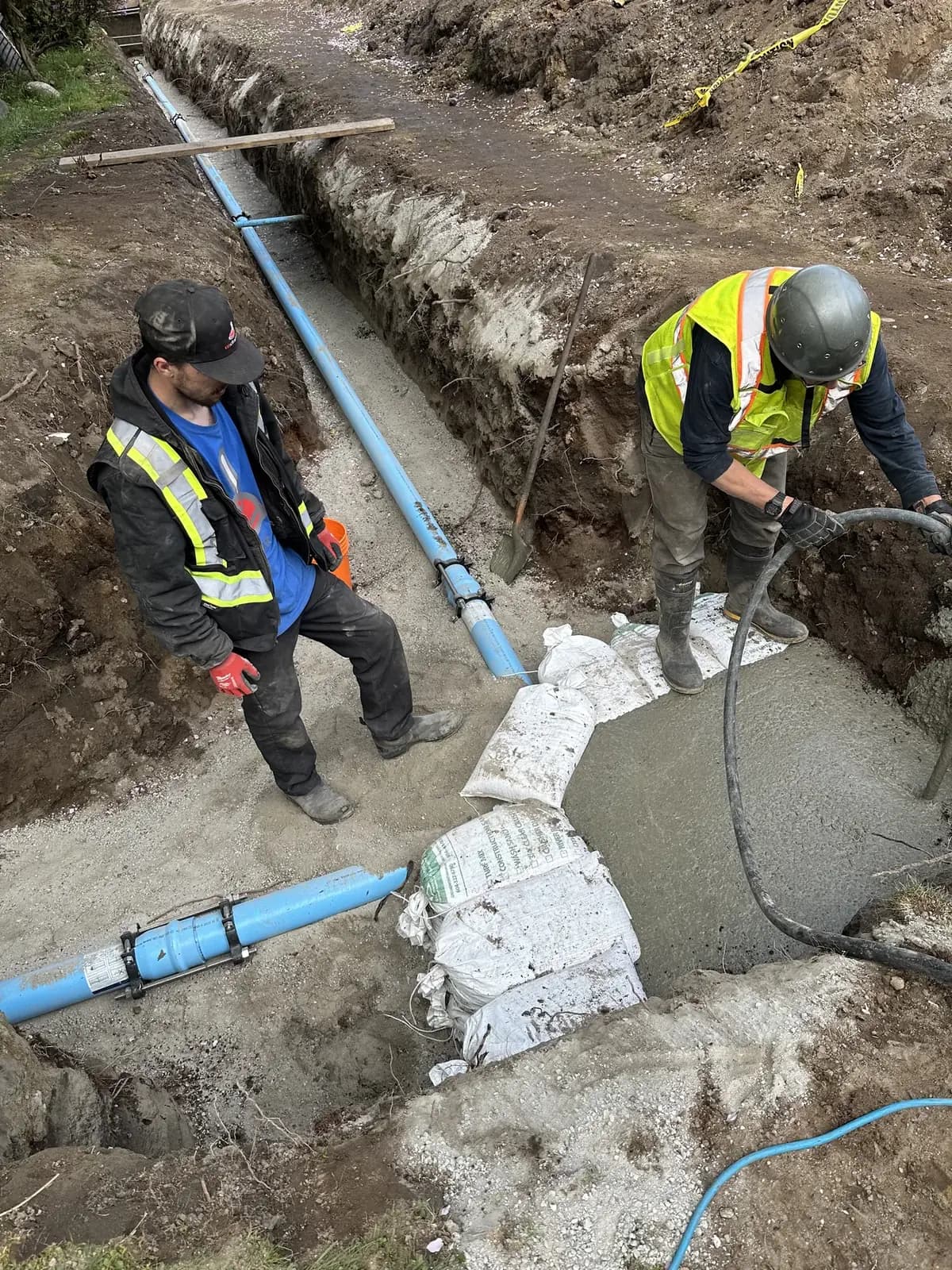 Pure Mechanical technicians installing a new blue water service